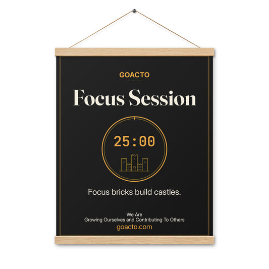Focus Session Oak Hanger Poster, Brick Rise design, 16x20 on natural oak wood bars: thin gold ring around a 25:00 timer with a small line-drawn castle inside, on charcoal, the line 'Focus bricks build castles.' and 'We Are / Growing Ourselves and Contributing To Others' above goacto.com