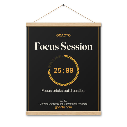 Focus Session Oak Hanger Poster, Brick Ring design, 16x20 on natural oak wood bars: ring of gold bricks around a 25:00 timer, on charcoal, the line 'Focus bricks build castles.' and 'We Are / Growing Ourselves and Contributing To Others' above goacto.com