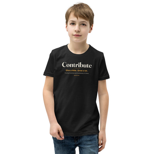 Contribute Youth Tee by GOACTO in black, worn by a child: 'Contribute' in cream serif type, 'Give a little. Grow a lot.' in amber, then 'Growing Ourselves and Contributing To Others' and goacto.com across the chest
